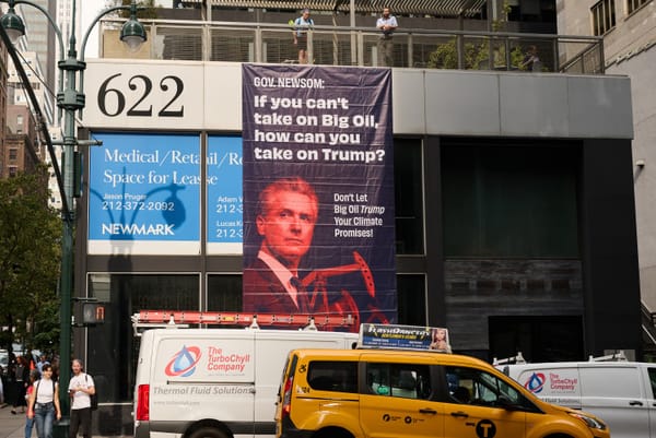 Over 40 groups call out Newsom for backsliding on climate promises, banner dropped in New York City